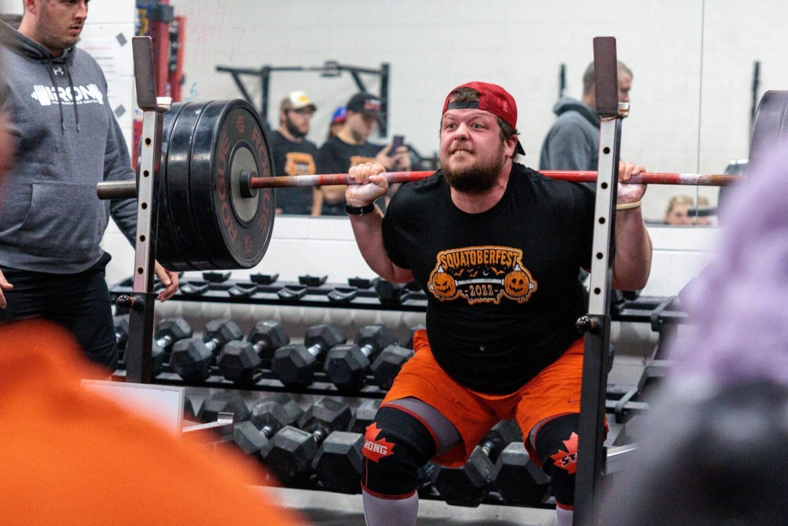 Coach Myles Methner participating in Squatober in 2022
